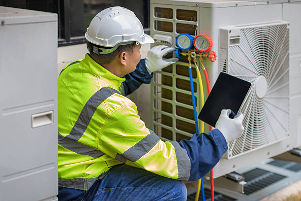 Professional Hvac technician working in Giddings, TX